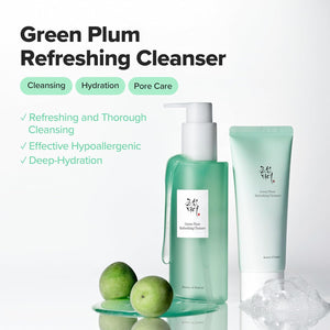 Green Plum Refreshing Cleanser with green plums on a white background