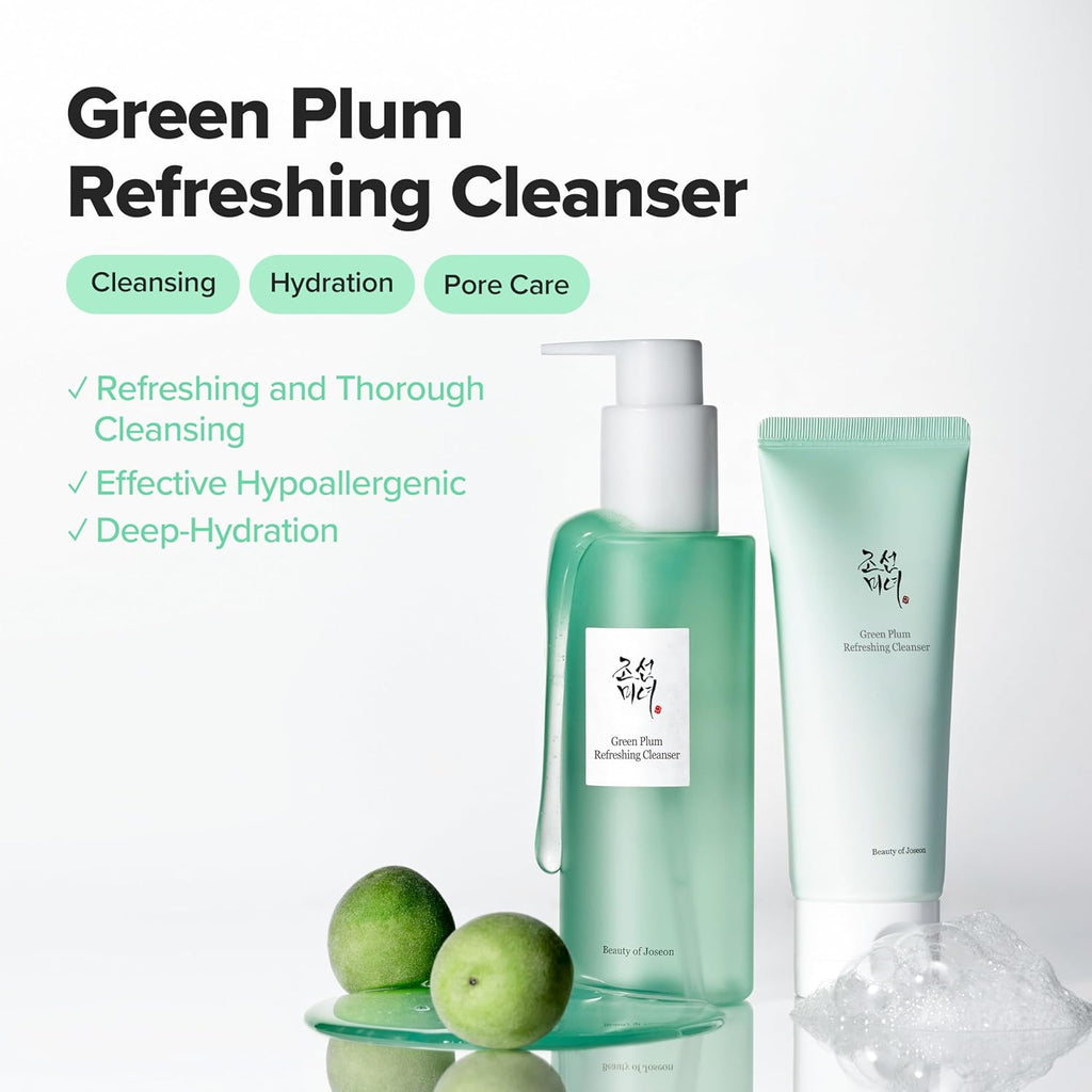 Green Plum Refreshing Cleanser with green plums on a white background