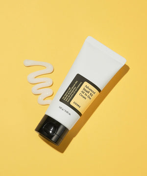 Cosrx cream tube with a swatch on a yellow background